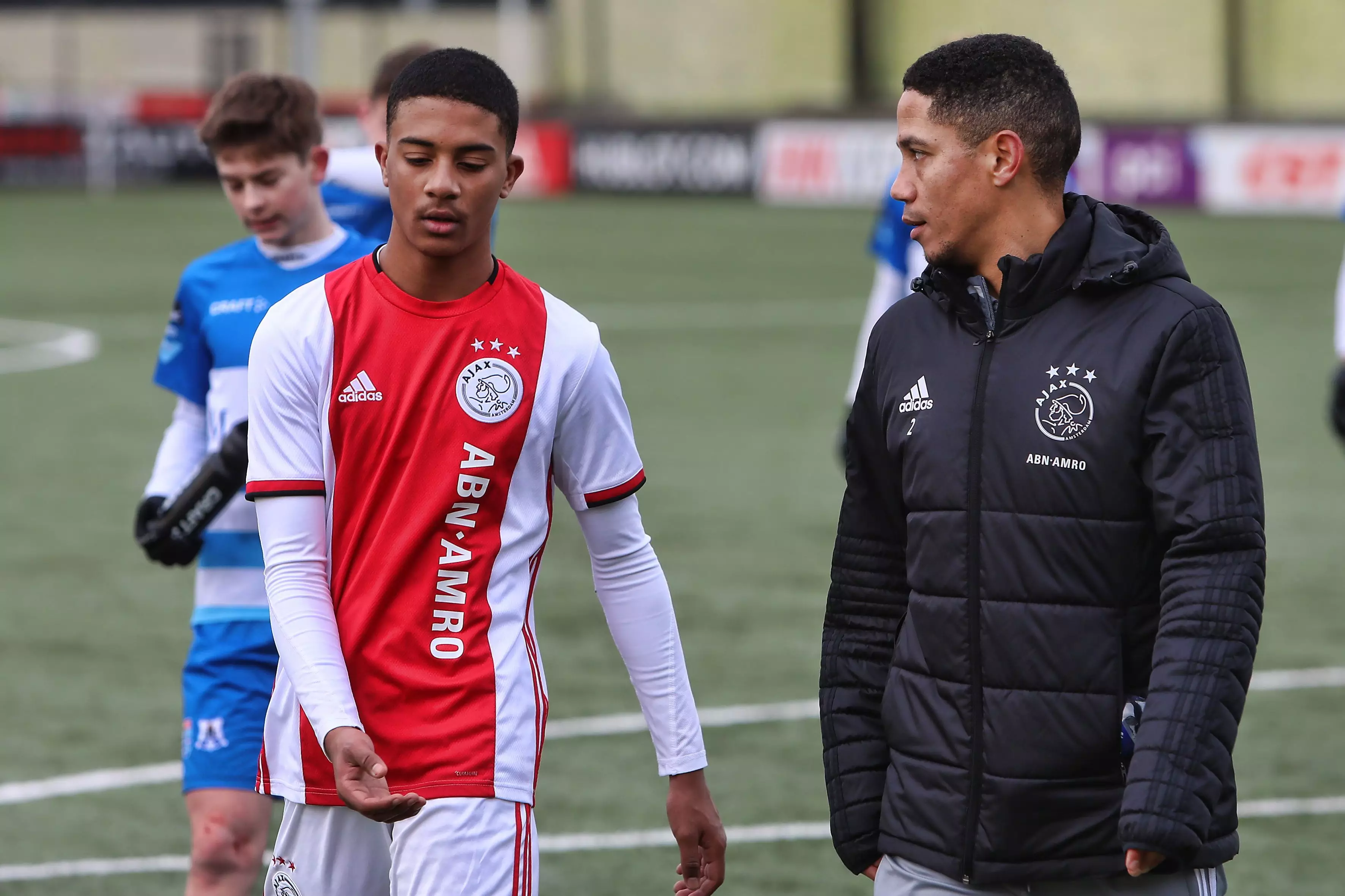 Ajax academy coach Steven Pienaar with one of his players. Image: PA Images