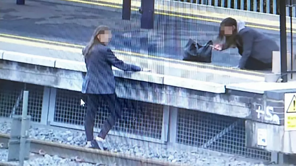 Two Schoolgirls Risk Their Lives Posing For Selfies On Train Tracks