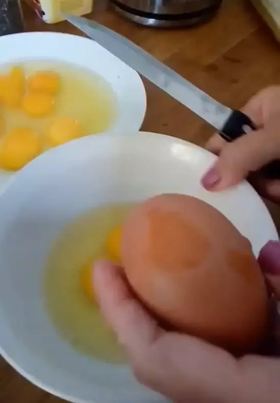 The woman cracked open a whopping 14 double-yolk eggs.