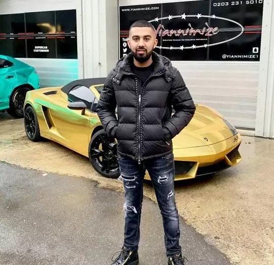 Lak and his Lambo before it set on fire.