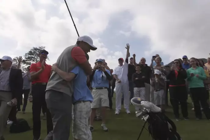 Tiger Woods Watches On As 11-Year-Old Hits A Hole In One At New Golf Course