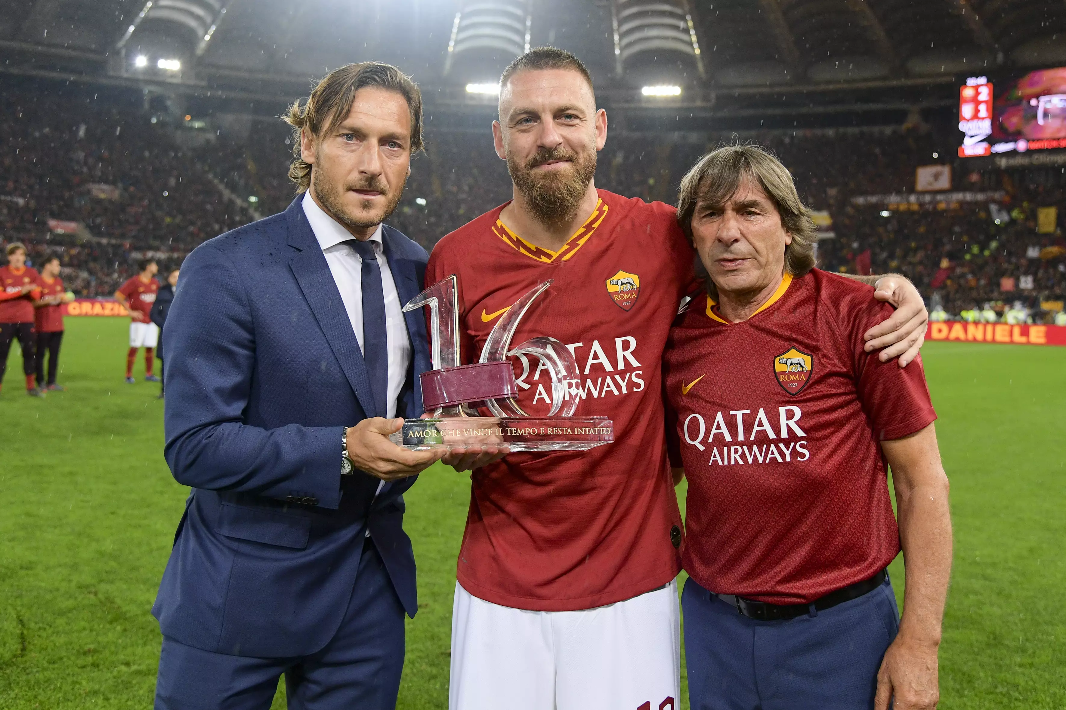 Totti as club director when former teammate Daniele de Rossi was leaving the club. Image: PA Images