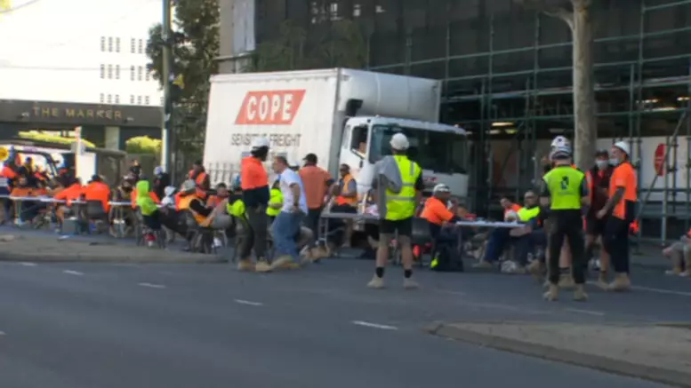 Aussie Tradies Protest Tearoom Ban By Shutting Down Streets To Have Lunch Break