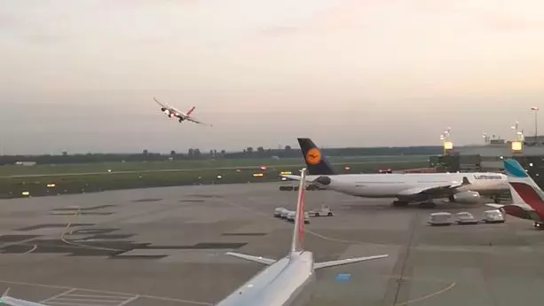 Plane Flies Incredibly Low To Ground In 'Honorary Lap' Stunt  