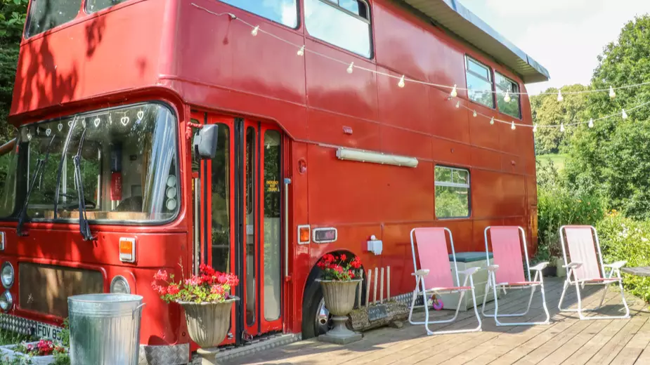 You And Your BFFs Can Now Stay In A Giant Red Bus With An Outdoor Hot Tub