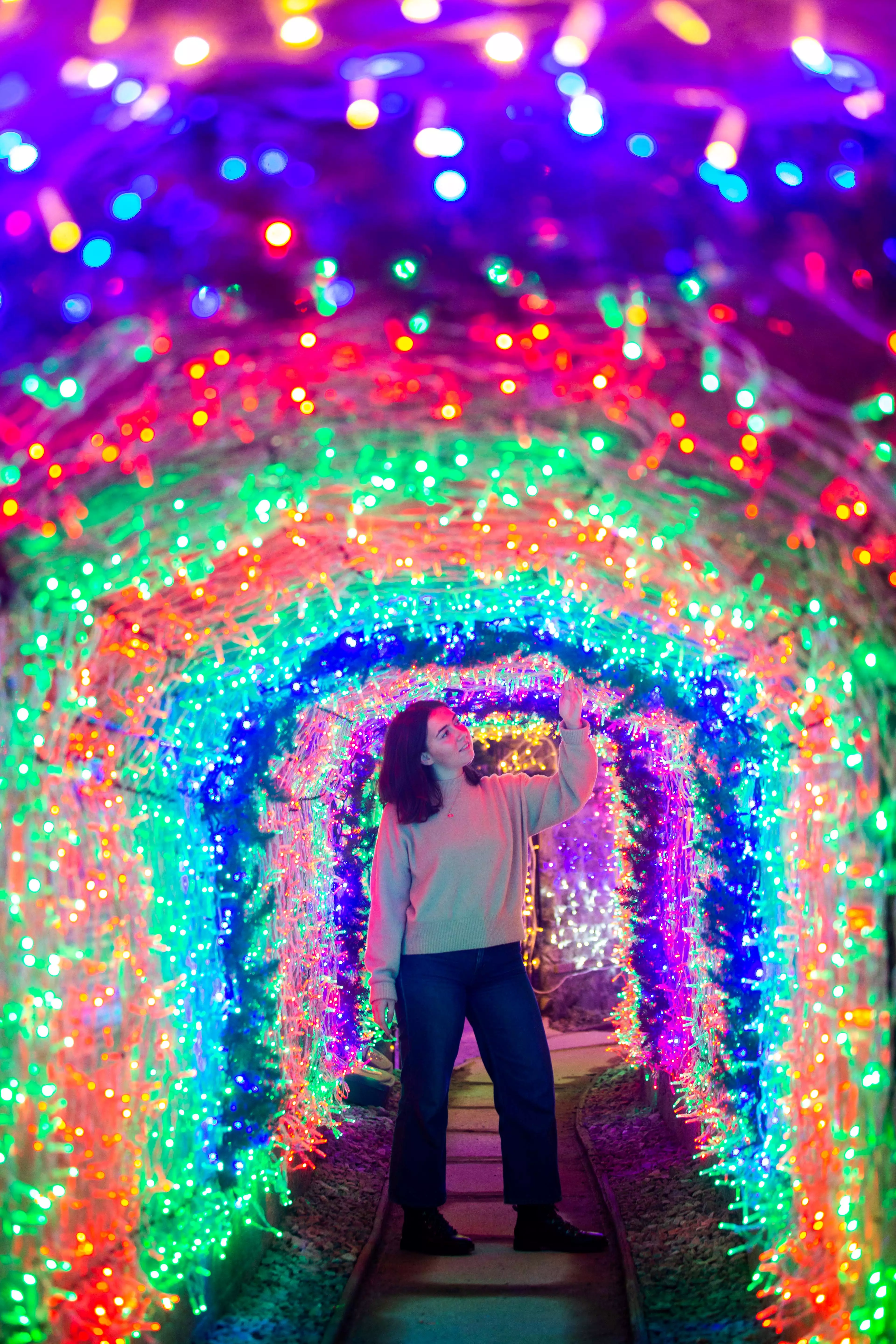 The 110-metre-long tunnel is brightly decorated with an astounding 40,000 multi-colour lights (