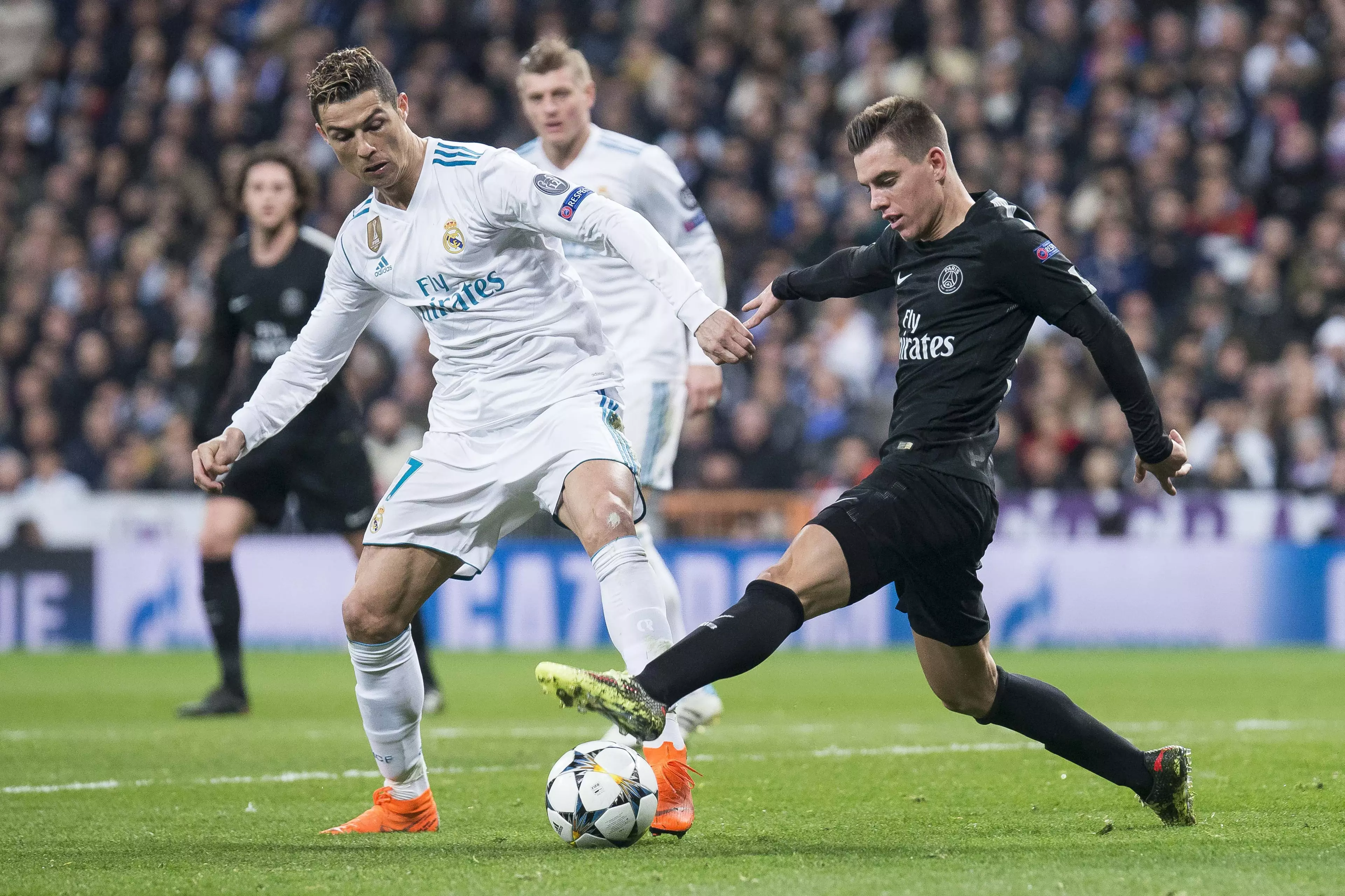 Giovani Lo Celso vying for the ball with Ronaldo. Image: PA