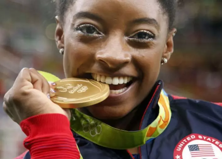 Here's Why Olympians Bite Their Medals