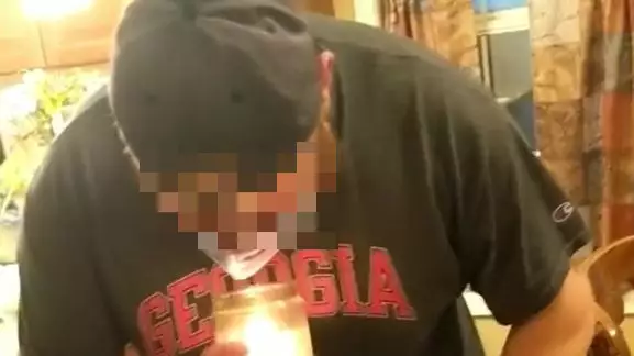 Man Tries To Prove Masks Don't Work By Blowing Out Candle In One And It Backfires