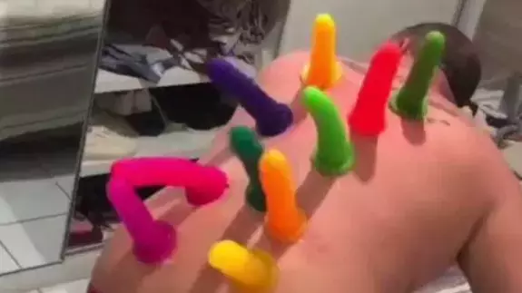 Guy Wakes Up To Find Mates Have Glued 10 Dildos To His Back