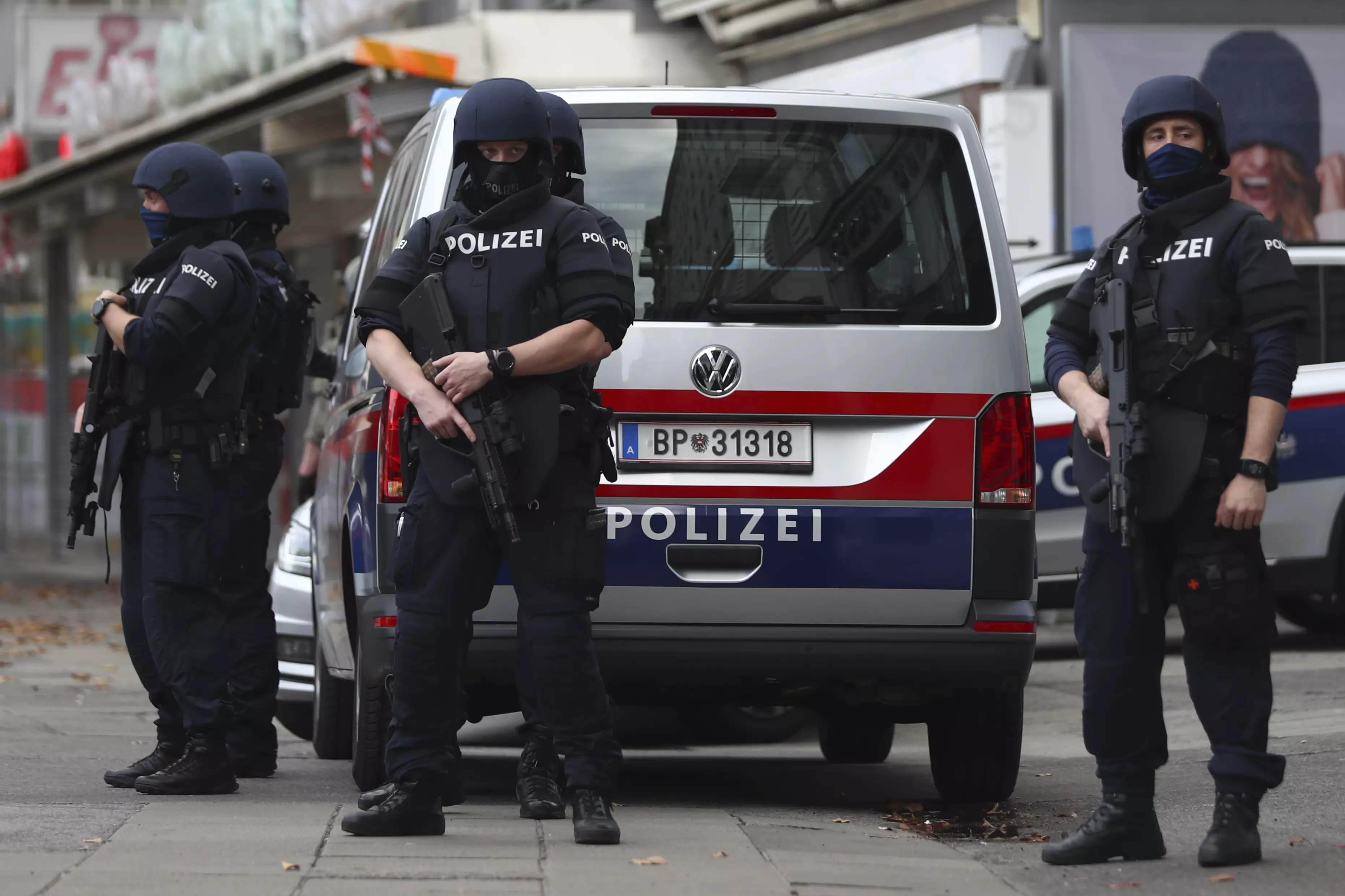 Police officers guard the scene in Vienna.