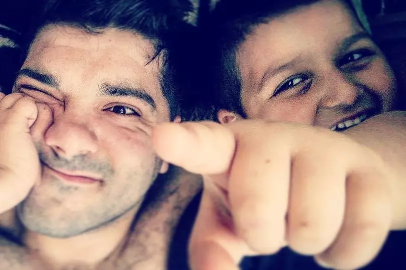 Asad Murad and his nephew, six-year-old Alex.