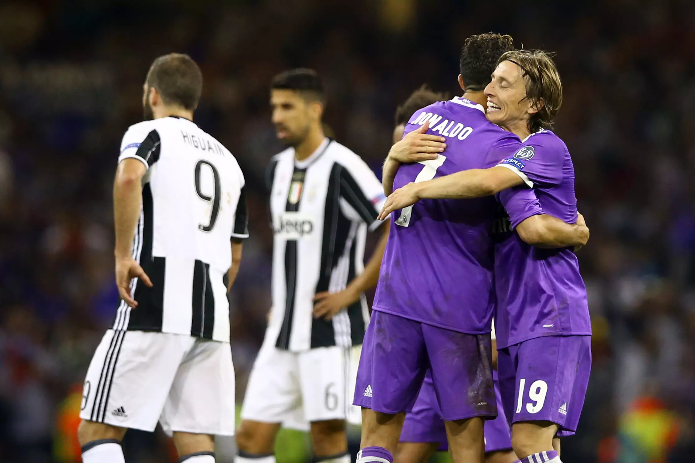 Modric and Ronaldo hug after Champions League glory. Image: PA