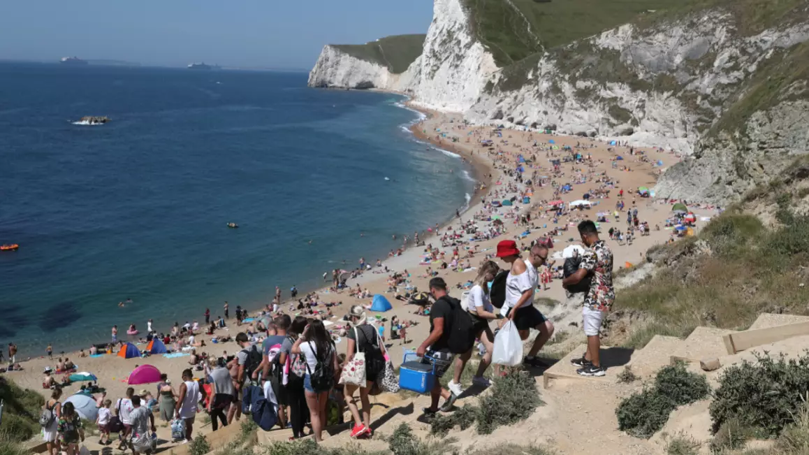 ​People Flock To UK Beaches Despite Continued Warnings On Social Distancing Measures
