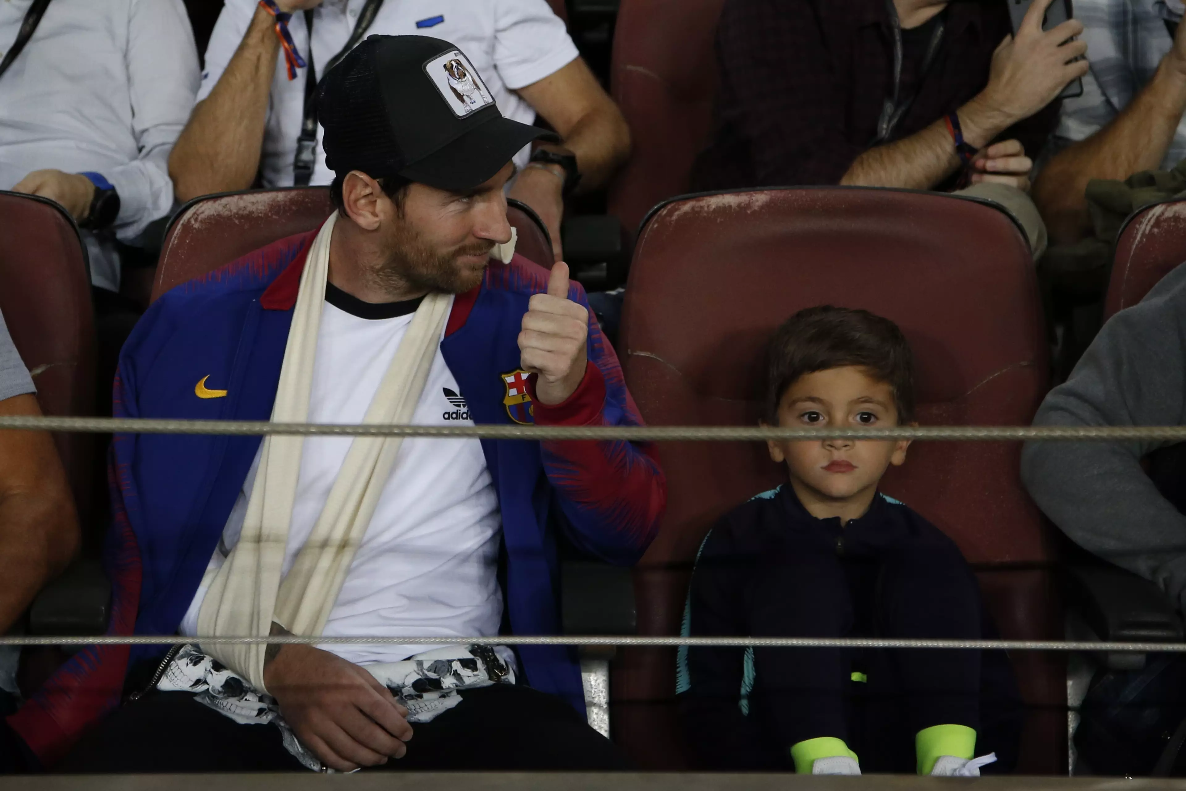 Messi is clearly enjoying watching for once. Image: PA Images