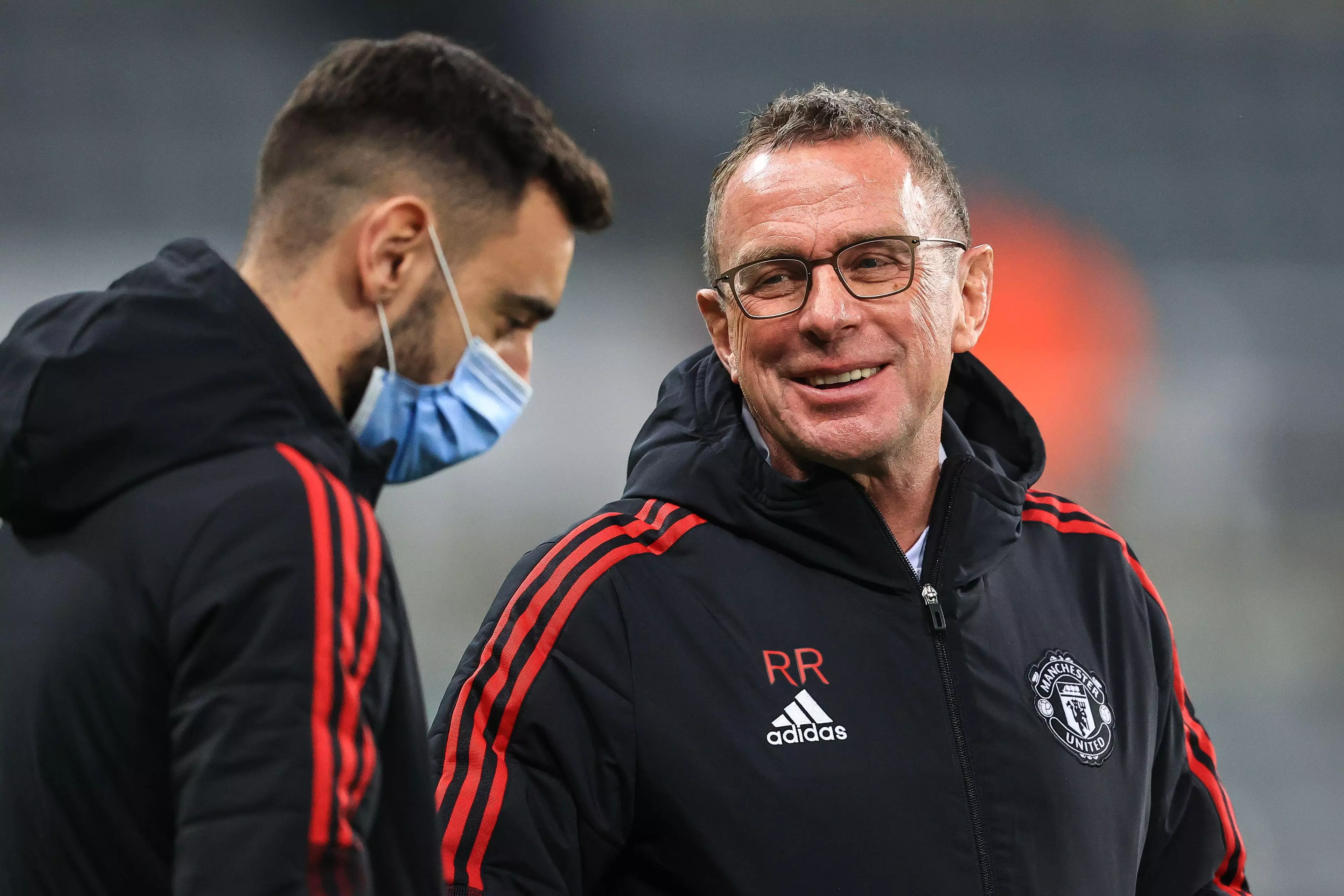 Manchester United manager Ralf Rangnick in conversation with Bruno Fernandes