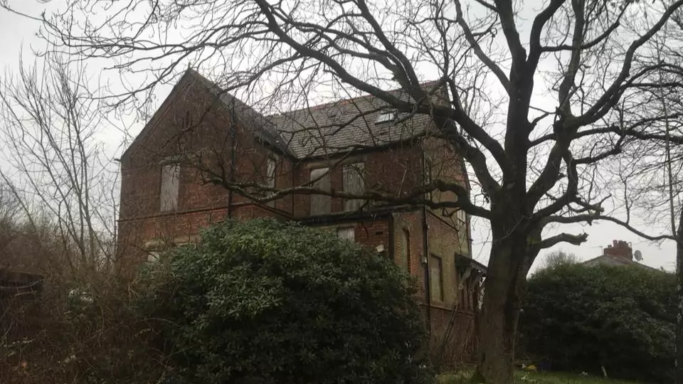 Urban Explorer Finds Creepy Prison-Like Door In Abandoned Nursing Home