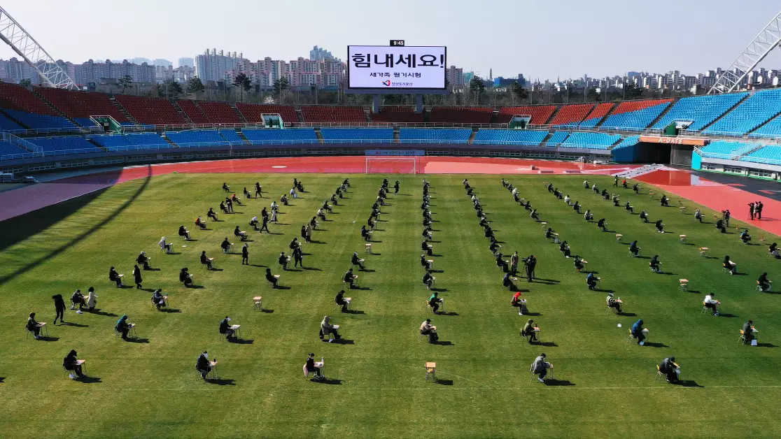 South Korean Jobseekers Take Written Exam In Football Stadium To Avoid Coronavirus