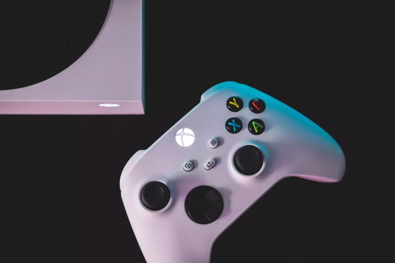 An Xbox Series S, and controller