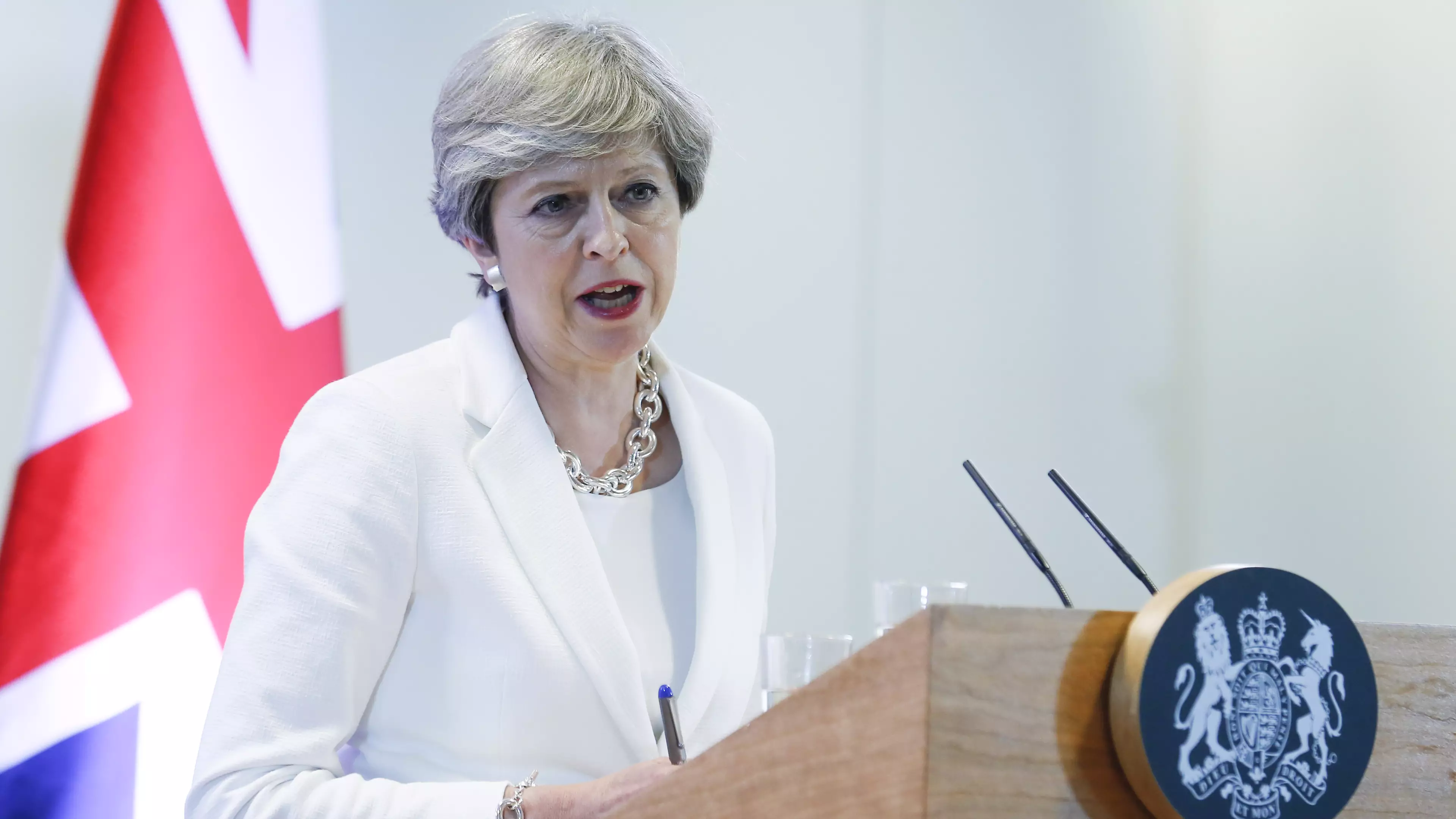 UK Prime Minister Theresa May attends a press conference in Brussels