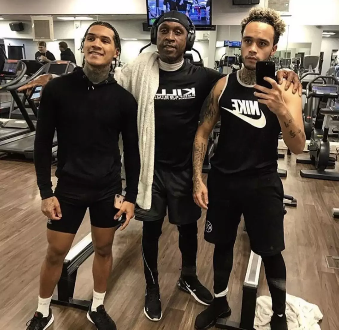 Conor Benn (left), Nigel Benn (centre) and Harley Benn (right) are all professional boxers (