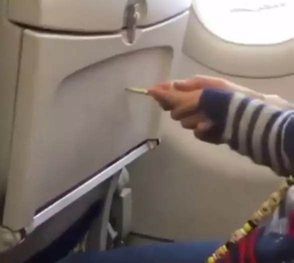 Some passengers have been filmed letting their kids draw all over the interior of the plane.