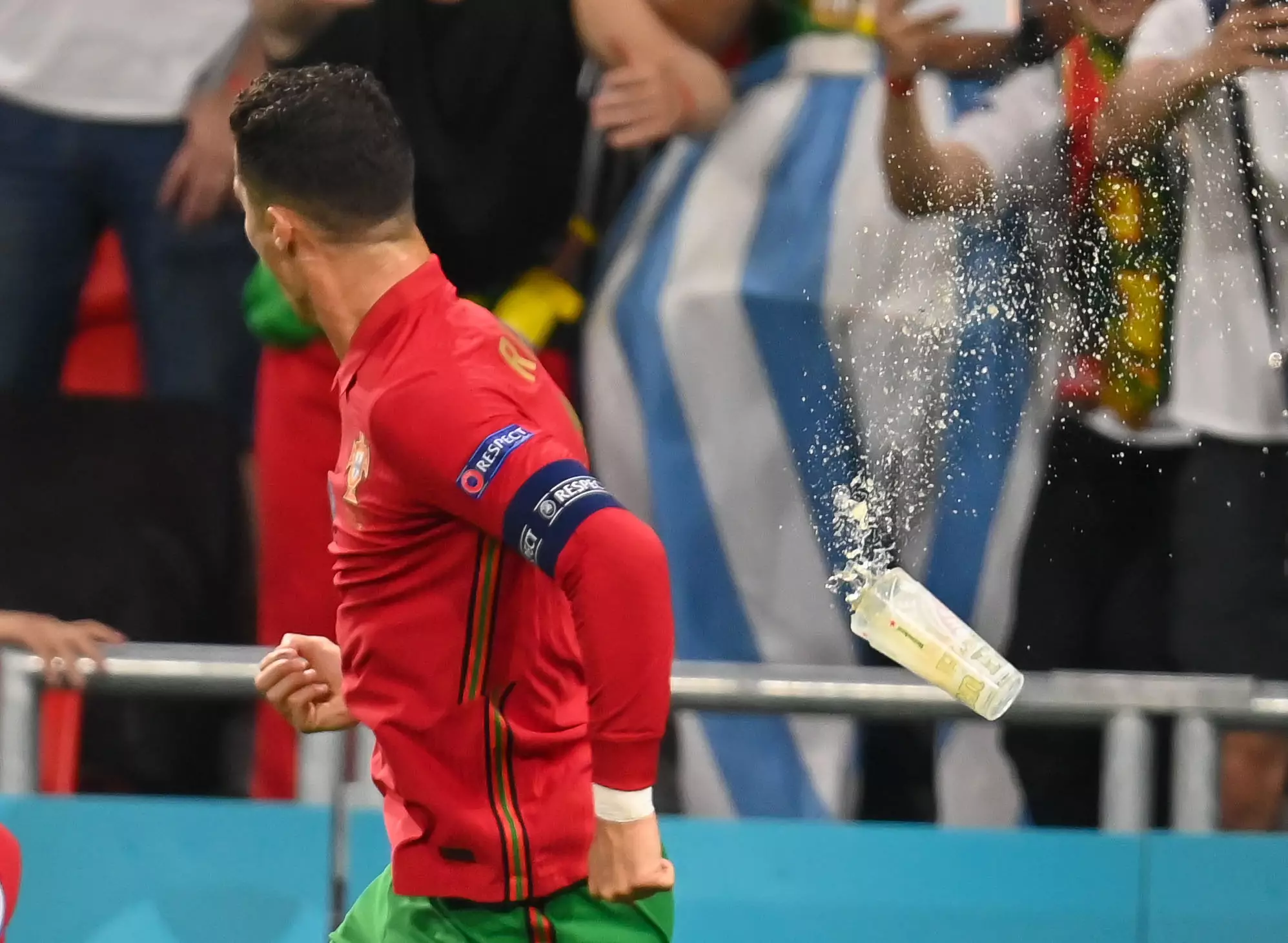 Fans also threw cups of beer at Ronaldo.