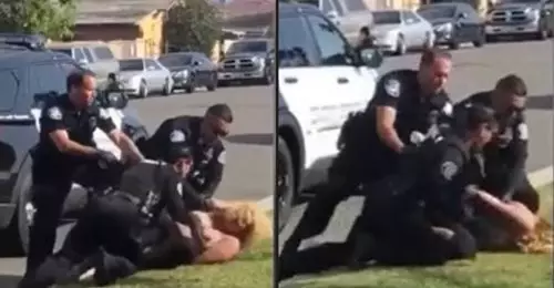 Police Officers Step In To Stop Fellow Cop Punching Woman In Face During Arrest