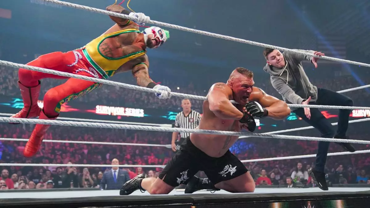 Lesnar takes a double 619 from Dominik and Rey Mysterio. Image: WWE