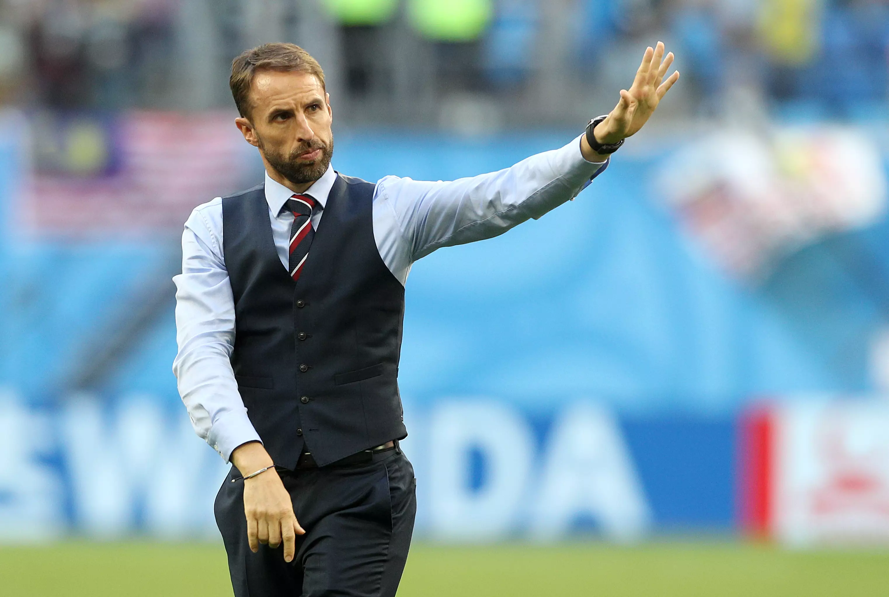 Southgate waves goodbye to the traveling England support. Image: PA