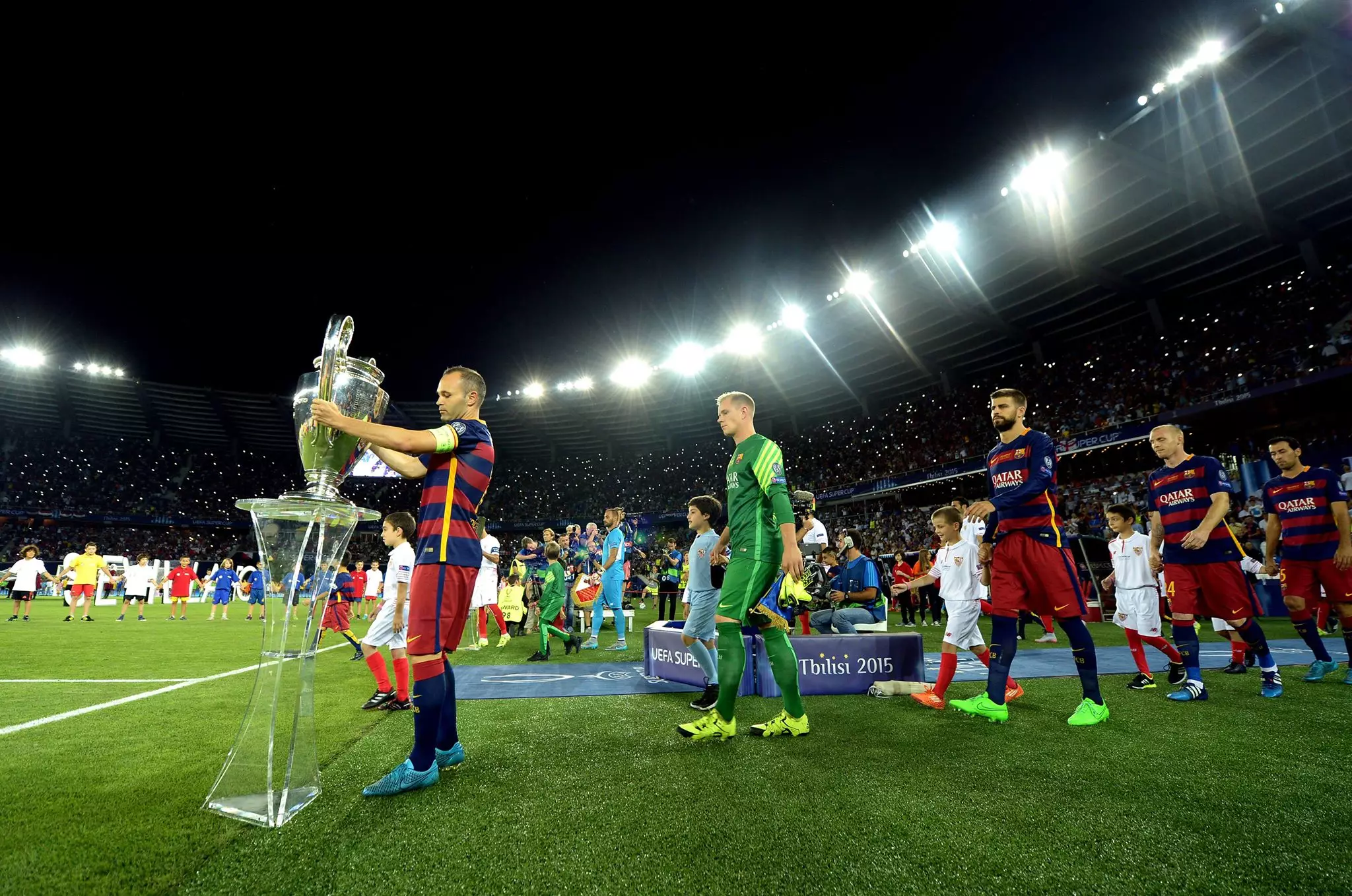 Iniesta with his fourth Champions League trophy. Image: PA Images