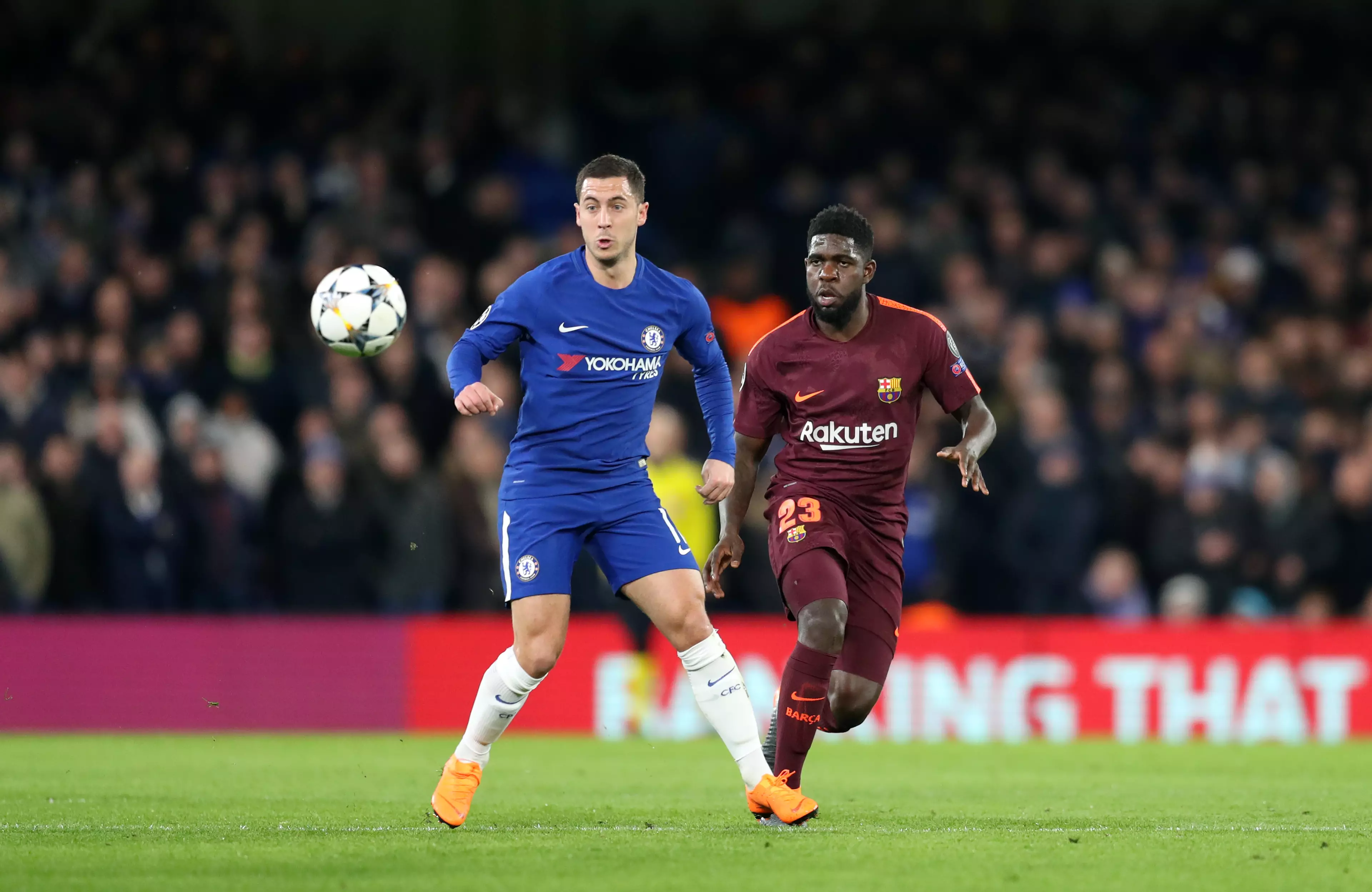Umtiti and Hazard battle for the ball in the Champions League. Image: PA