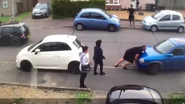 Strongman Picks Up And Moves Car That's Blocking Him In 