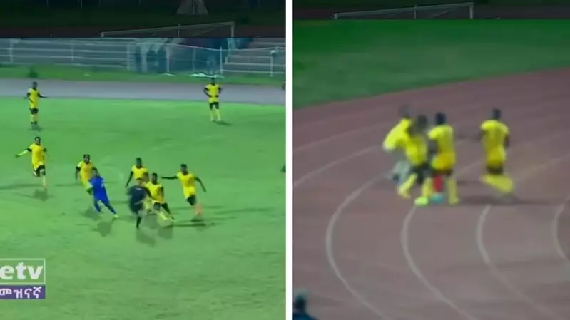 Referee Makes Decision, Gets Chased By Mob Of Players And Beaten After Defending Himself With Corner Flag