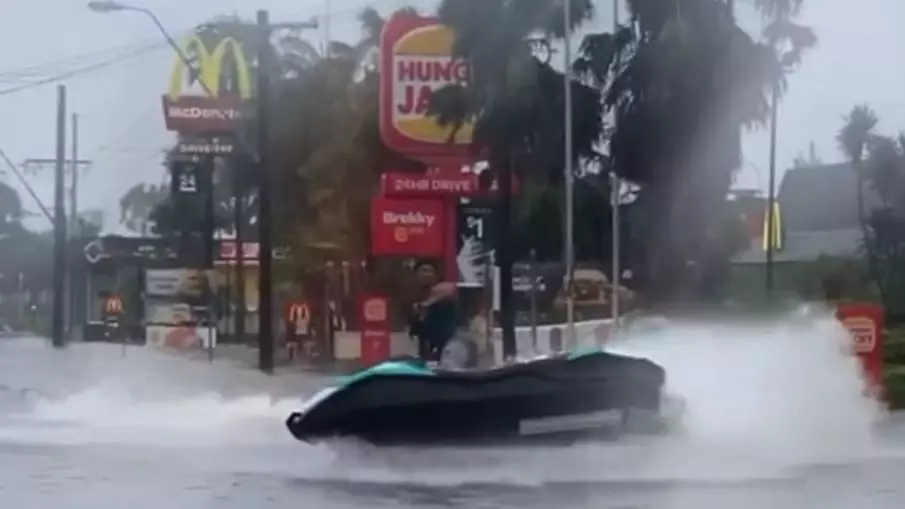 Australian Man Seen Riding Jet Ski Past McDonald's In Flash Floods 