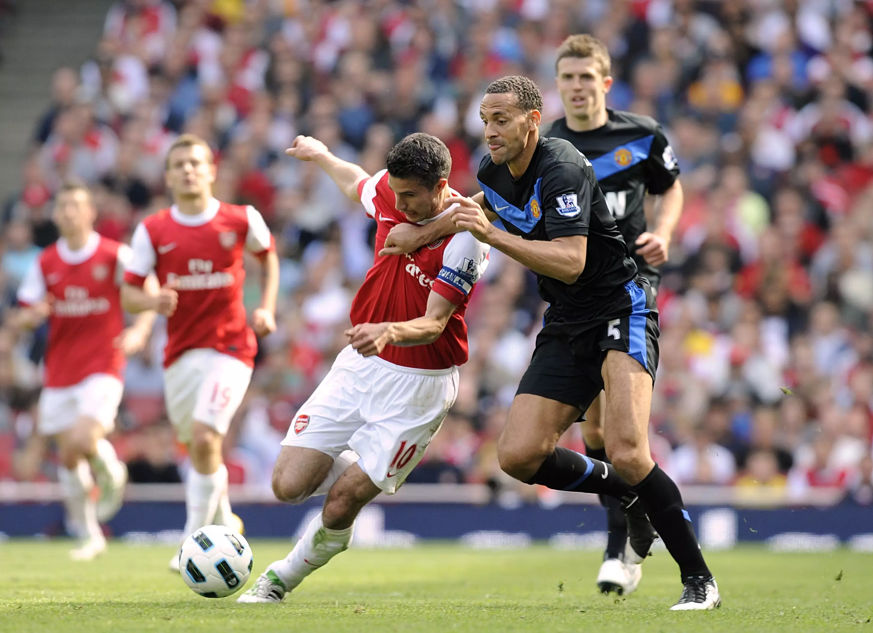 Robin van Persie had many tussles with Rio Ferdinand while he was at Arsenal