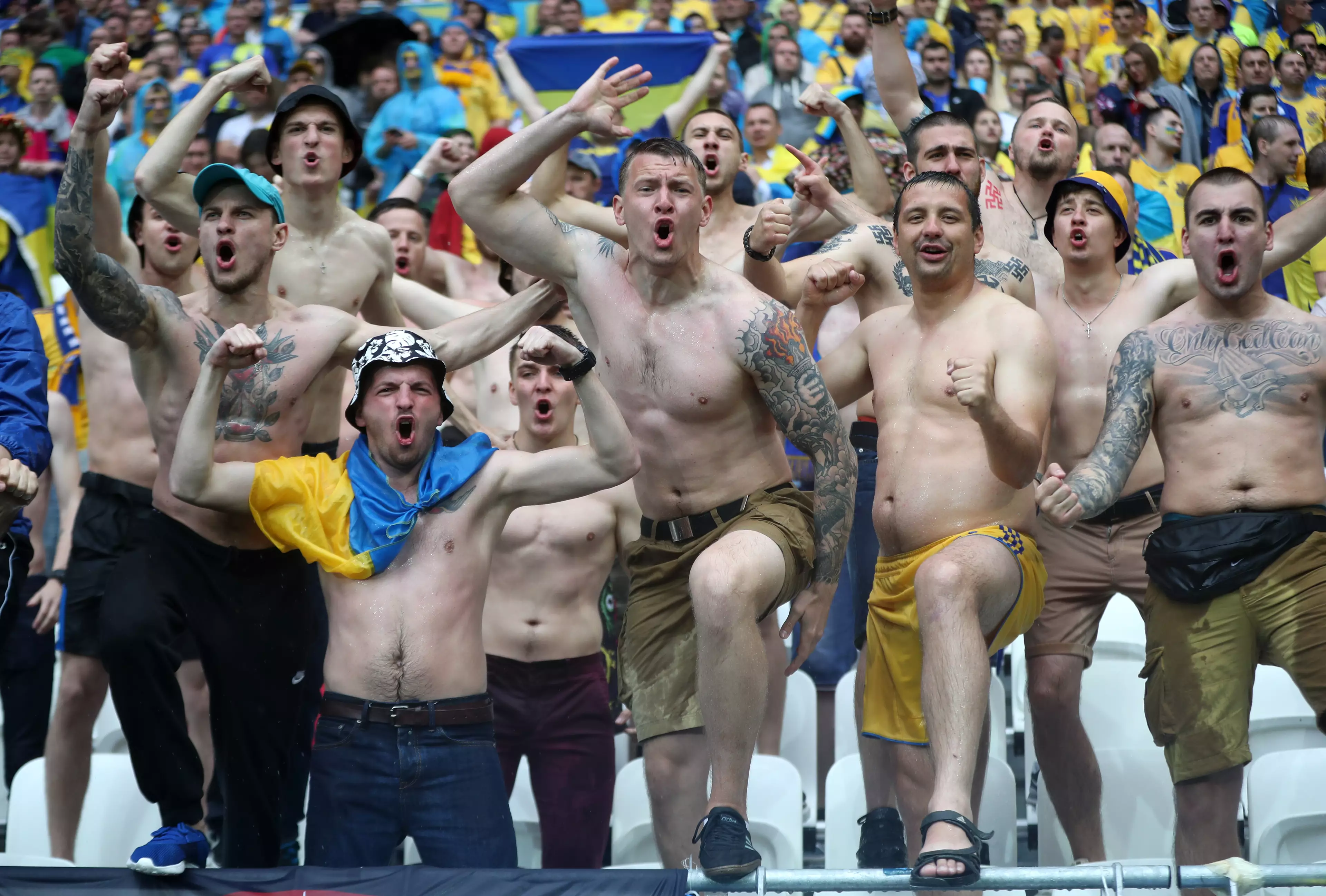 Ukraine Fans Show Off Grotesque Nazi Tattoos During Northern Ireland Game