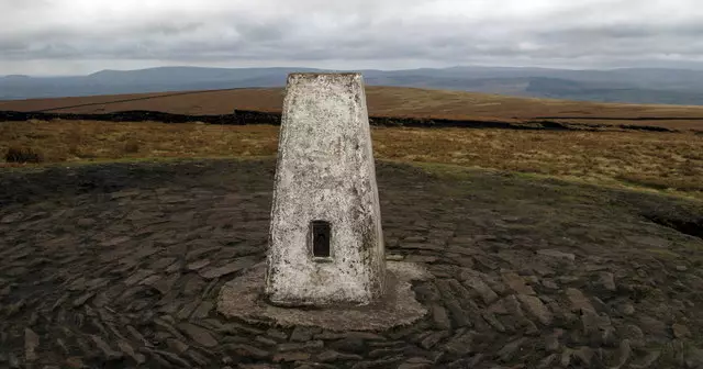 Trig Point on Pendle Hill in Lancashire. The Pendle Hill Witches live in the surrounding areas of the hill and were accused of killing twelve people by witchcraft. (