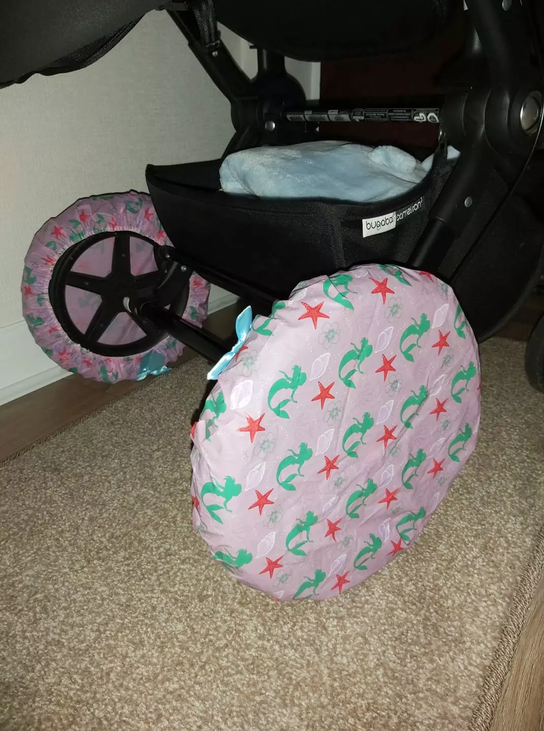Laura added shower caps onto her pram wheels to stop mud from getting into the house (