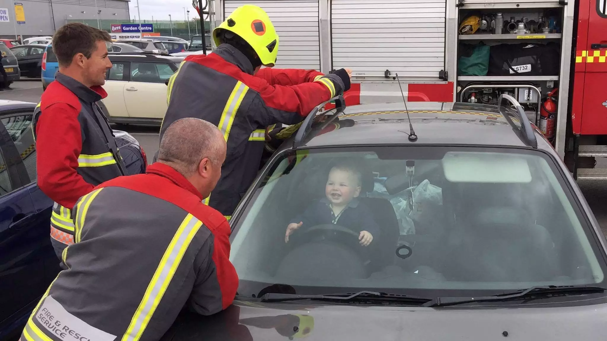 Toddler Accidentally Locked In Mum's Car Laughs As Rescuers Try To Free Him