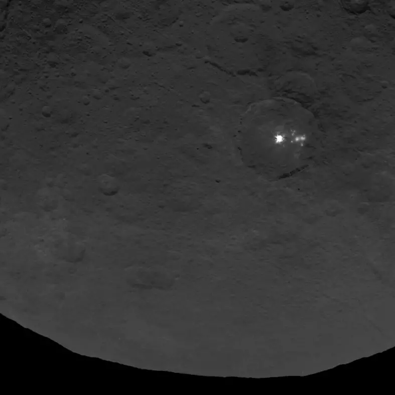 A cluster of mysterious bright spots on dwarf planet Ceres taken by NASA's Dawn spacecraft.