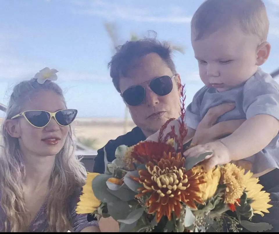 Grimes and Elon Musk with their baby son '