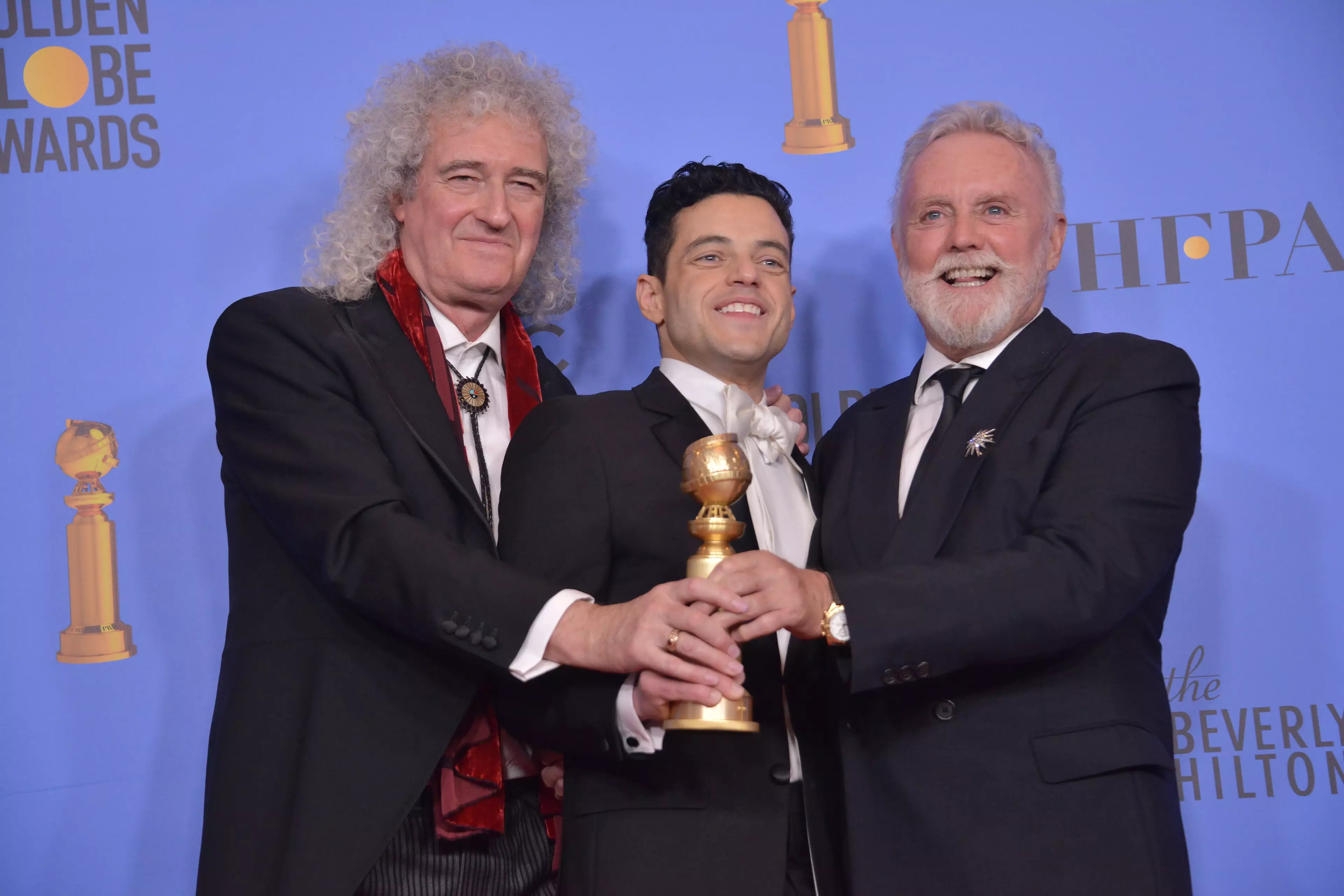 Roger Taylor and Brian May of Queen and Rami Malek at the Golden Globes.