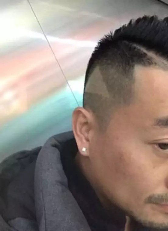 The triangle was shaved into the customer's hair.