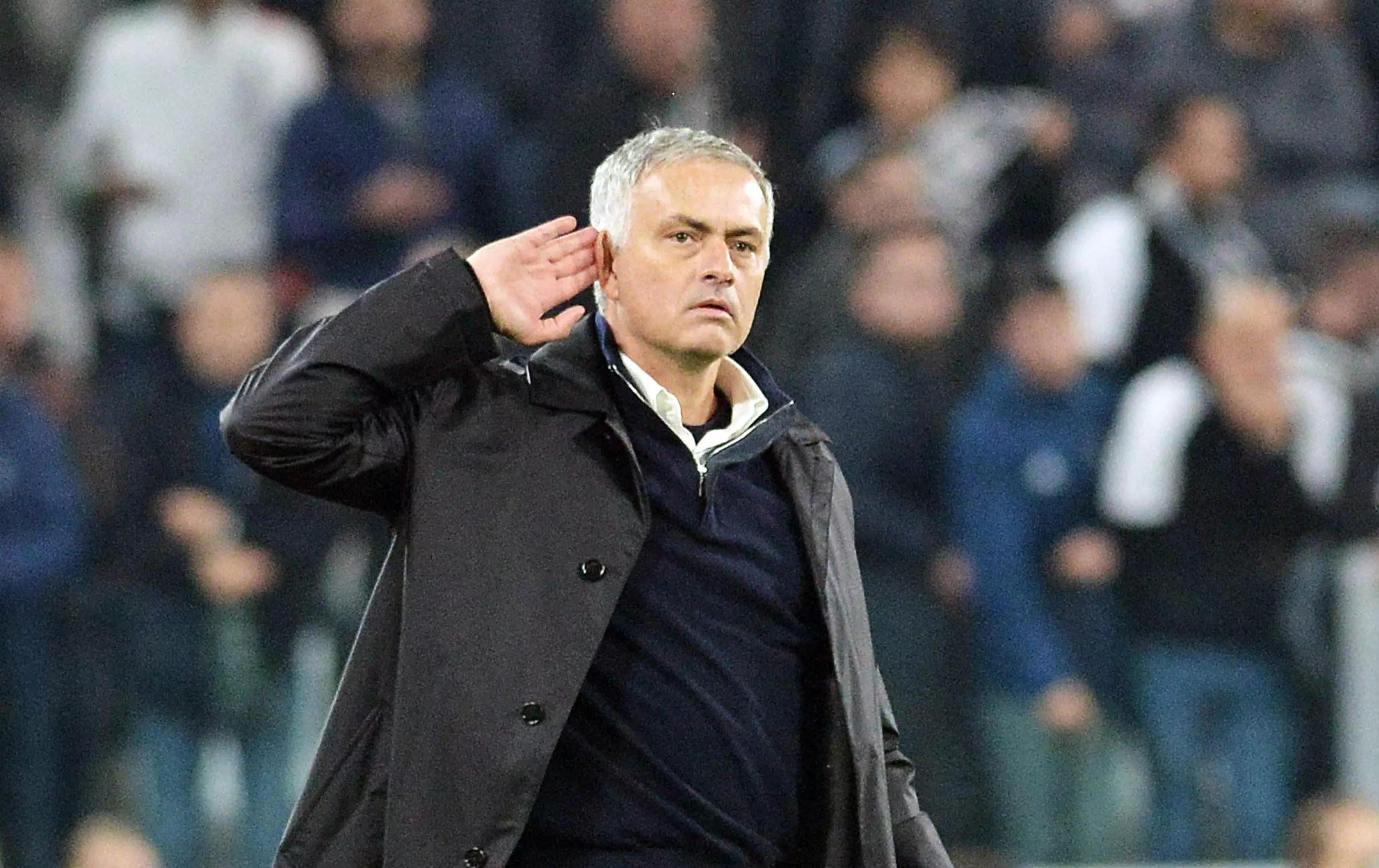 Mourinho cupping his ear on Wednesday night (