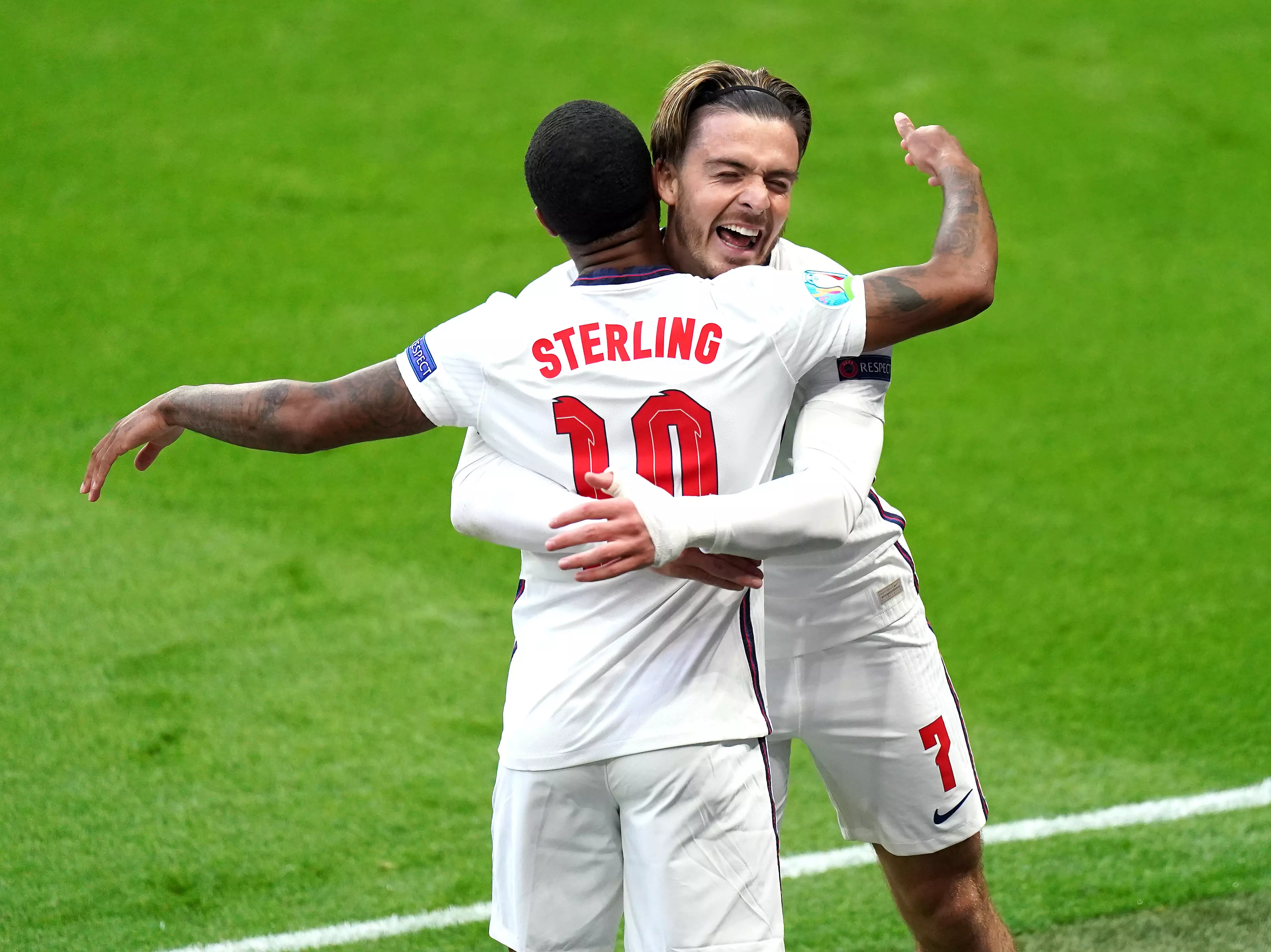 Grealish celebrating with potential new teammate Raheem Sterling. Image: PA Images