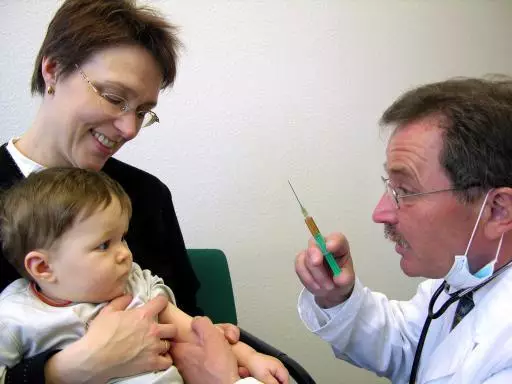 Stock image of a child getting vaccinated.