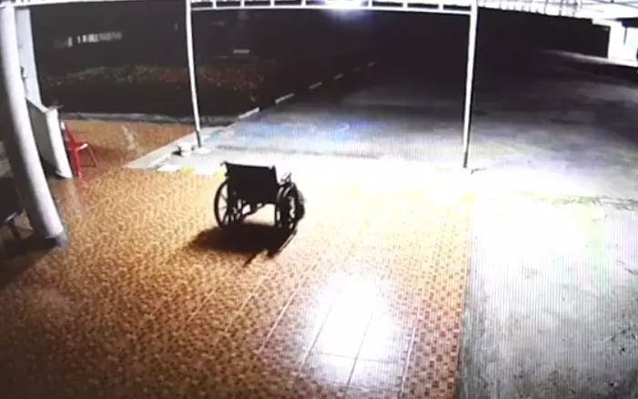 The wheelchair going backwards.