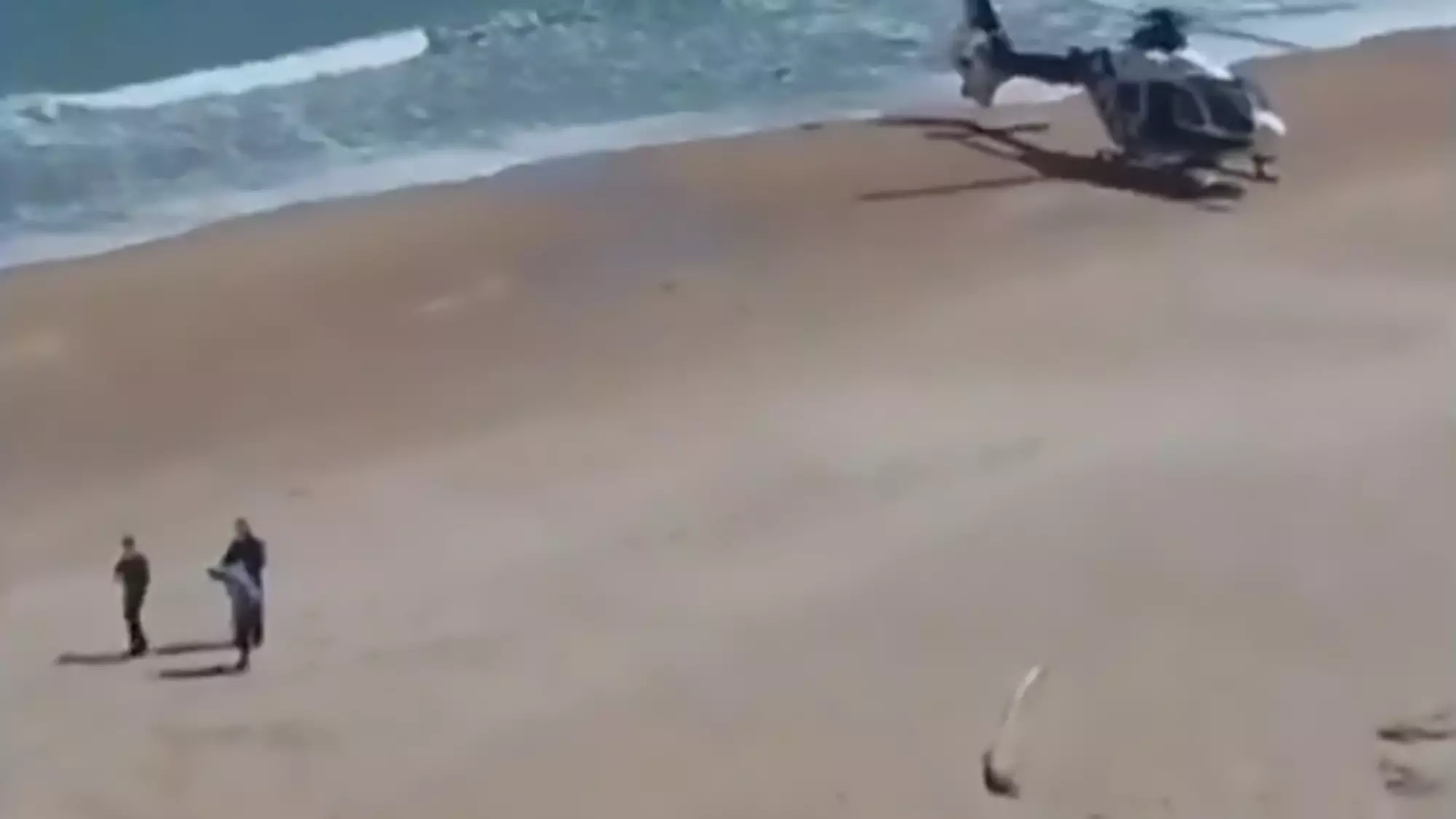Police Helicopter Lands On Spanish Beach As Man Breaks Lockdown