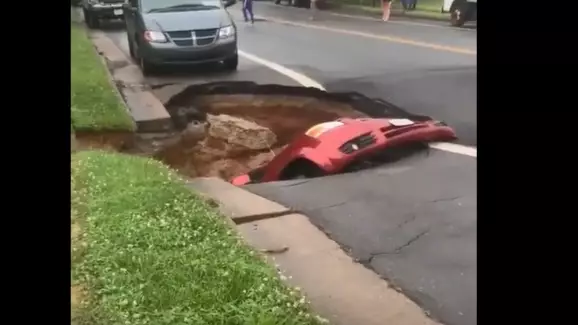 Massive Sinkhole Swallows Up Car In The US